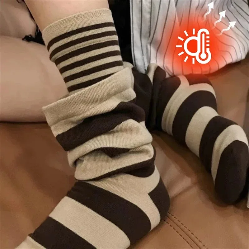 ถุงเท้ายาวสองชั้นปลอมแบบสองชิ้น คุณภาพสูง ลายทางเรียบง่าย สไตล์เกาหลี ใส่ได้หลายโอกาส ช่วยให้ดูผอม ถุงเท้าความยาวกลางน่องสำหรับผู้หญิง