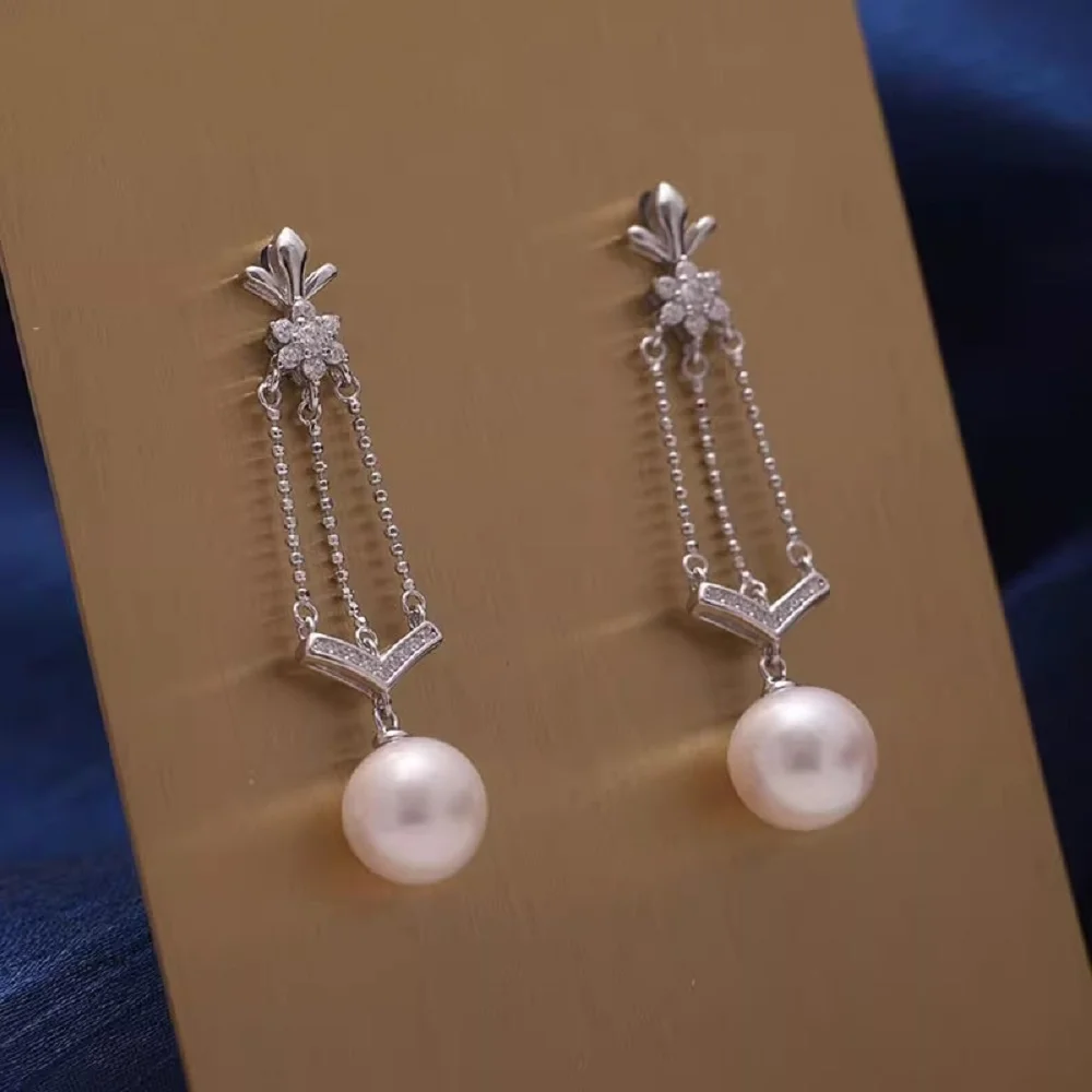 

Fashion earrings with AAAA10-11mm natural South Sea round pearl earrings 925s