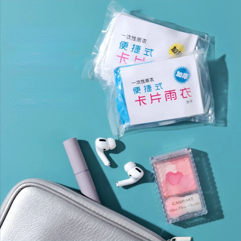 Disposable raincoat portable adult card raincoat vacuum compression packaging Mini raincoat