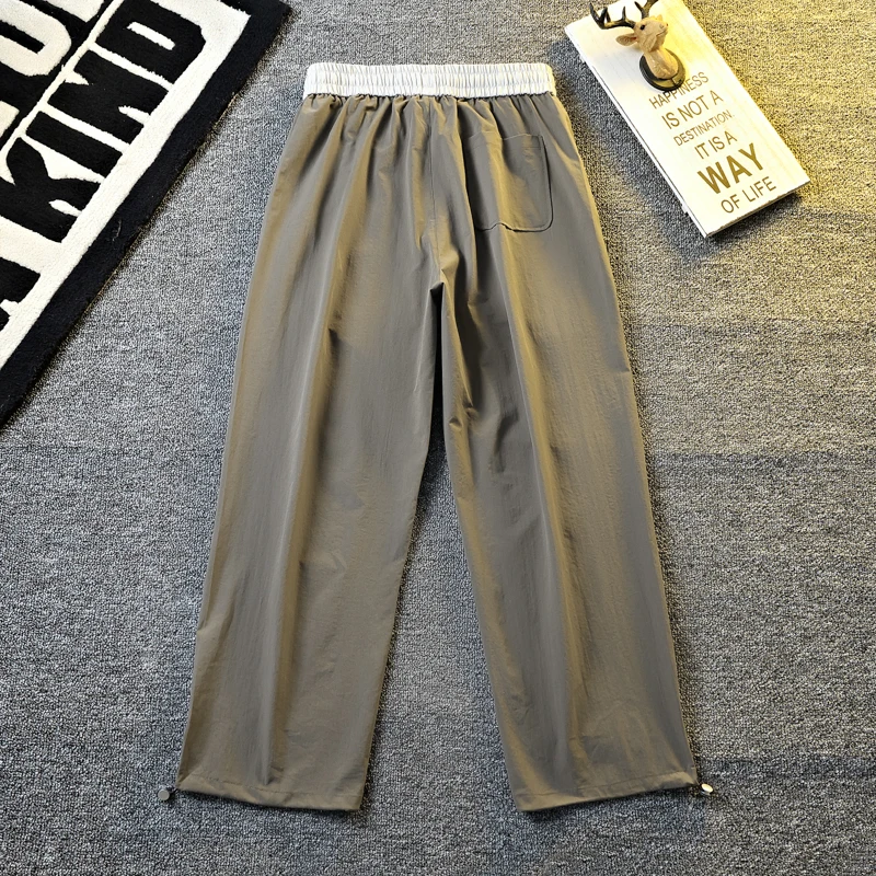 Men's Outdoor Sports Running Fitness Sweat Absorption Fast Drying Ice Silk Pants Fashionable and Trendy Loose Straight Leg Pants