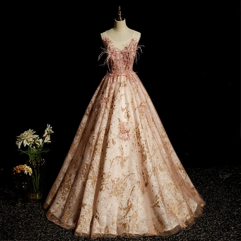 Nowe sukienki Vestidos Quinceanera z piórkiem klasyczna sukienka na imprezę elegancka suknia z prawdziwego zdjęcia luksusowe sukienka na studniówkę Robe De Bal