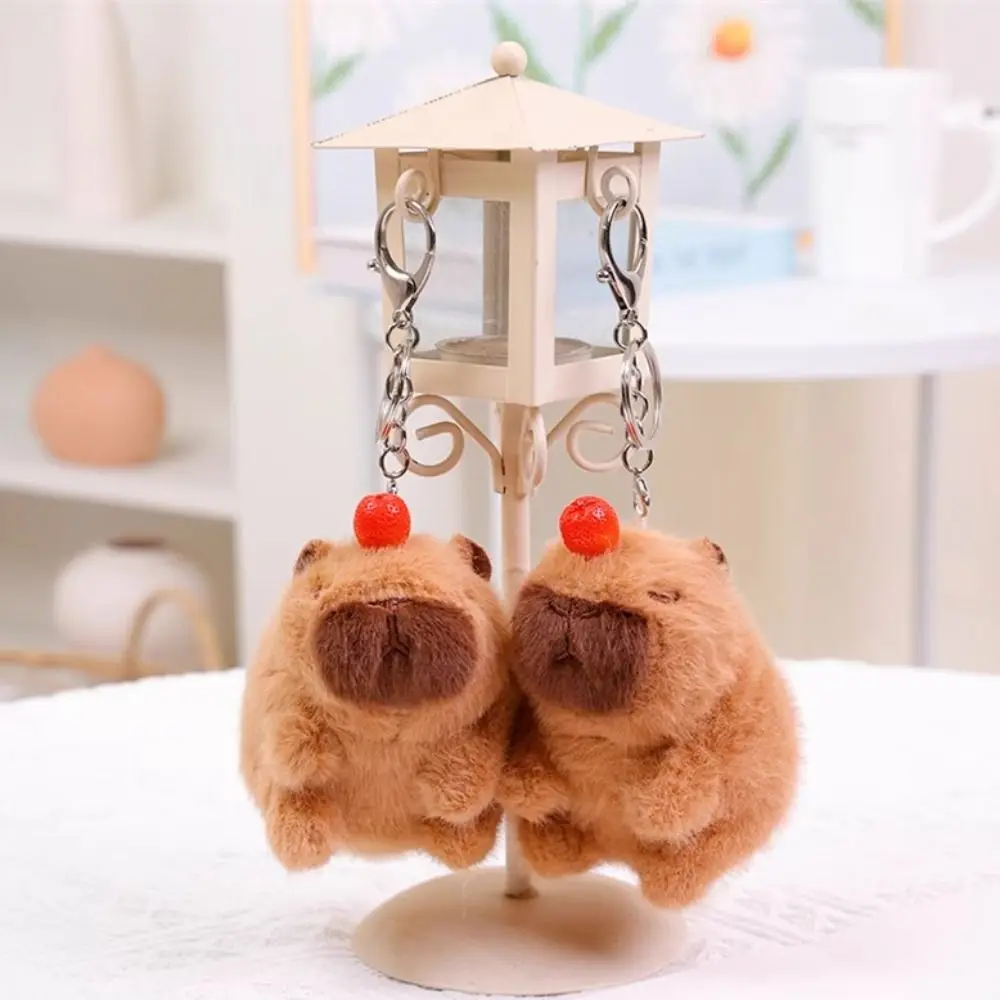 Kawaii Luminous Plush Capybara Keychain PP Cotton Wagging Tail Cartoon Couple Pendant Music Doll Capybara Keyring Bag Ornaments