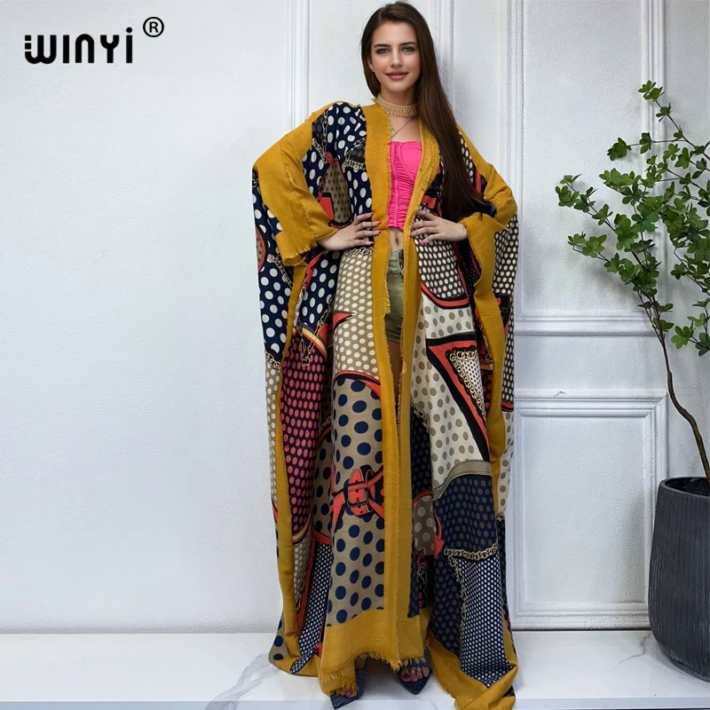 

WINYI Winter print Catwalk cloak High Quality poncho Luxury Long Loose OverCoat Thick Warm Female long down coat dress for women