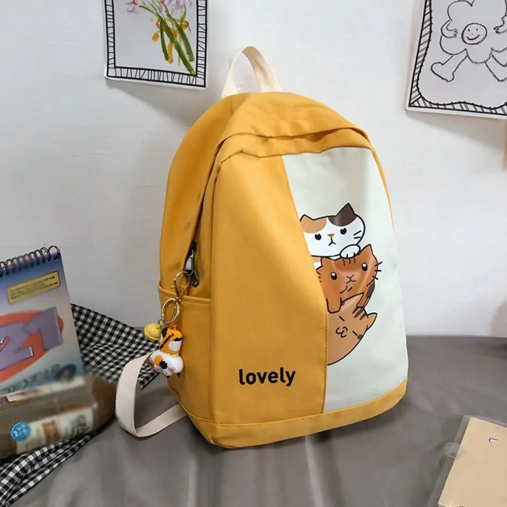 Mochila encantadora de moda para estudiantes, mochila universitaria con estampado de gato impermeable, bolso de hombro de nailon a la moda para adolescentes