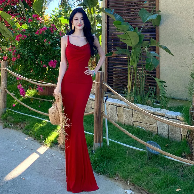 

2026 Summer New Hot Selling Bright Suspender Slim Fit Red Vacation Style Design Sense Trailing Long Skirt for Women