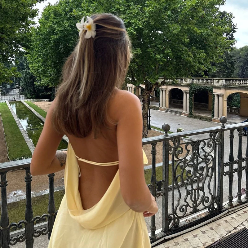 Mini abito sexy drappeggiato con scollo all'americana senza schienale da donna elegante trasparente con scollo a V profondo con lacci in rete abito da spiaggia per le vacanze 2024 nuovo