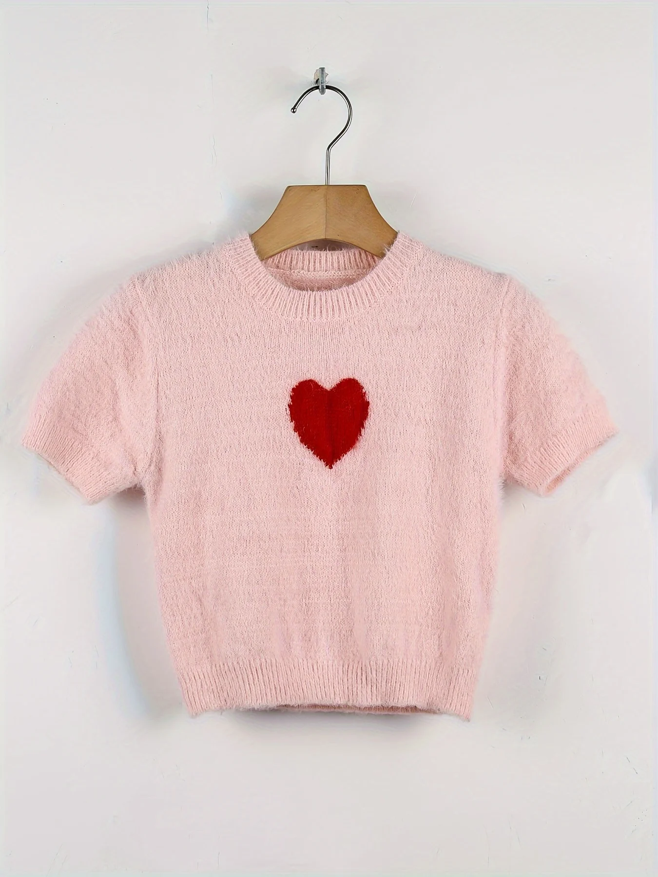 Autunno e inverno nuova moda donna maglione aderente girocollo cuore jacquard in pile manica corta pullover top in maglia