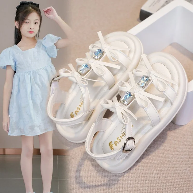 

Летние сандалии для девочек в корейском стиле, украшенные кристаллами, подростковые сандалии из искусственной кожи, водонепроницаемая пляжная обувь с противоскользящей подошвой.