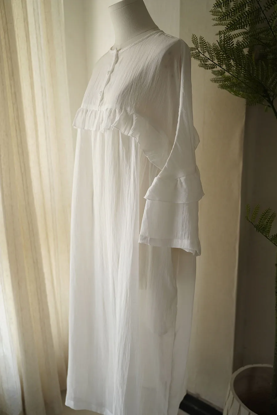 เดรสทรงหลวมสไตล์ศิลปะใหม่ปี 2026 ผ้ารามียับ คอทรงกลม แขนระบาย แต่งผ้าต่อกัน