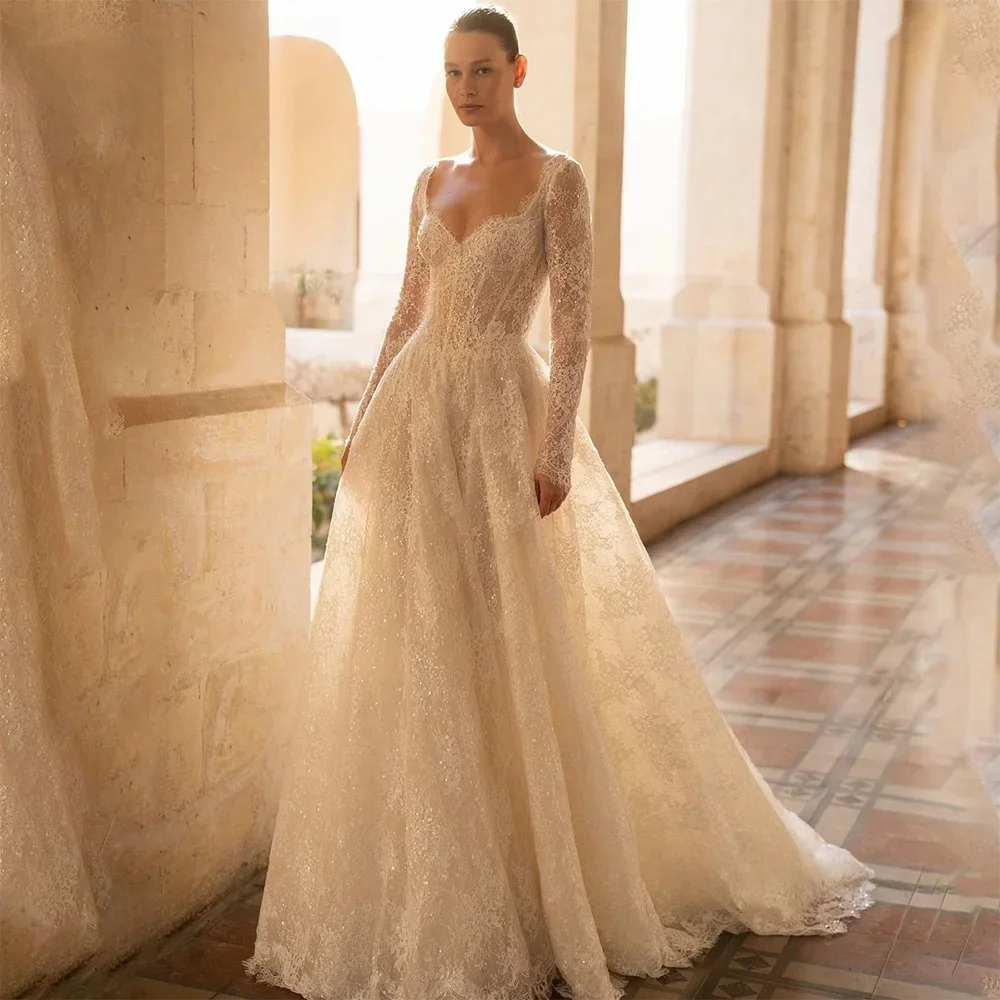 Robe de mariée de luxe en dentelle personnalisée, manches longues, paillettes brillantes, robe de mariée élégante