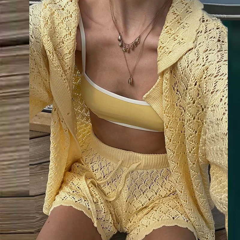 

Summer Vacation Casual Loose Beach Outfits Simple Lapel Button Crochet Top & Shorts Sets Women Hollow Solid Knitted 2 Piece Suit