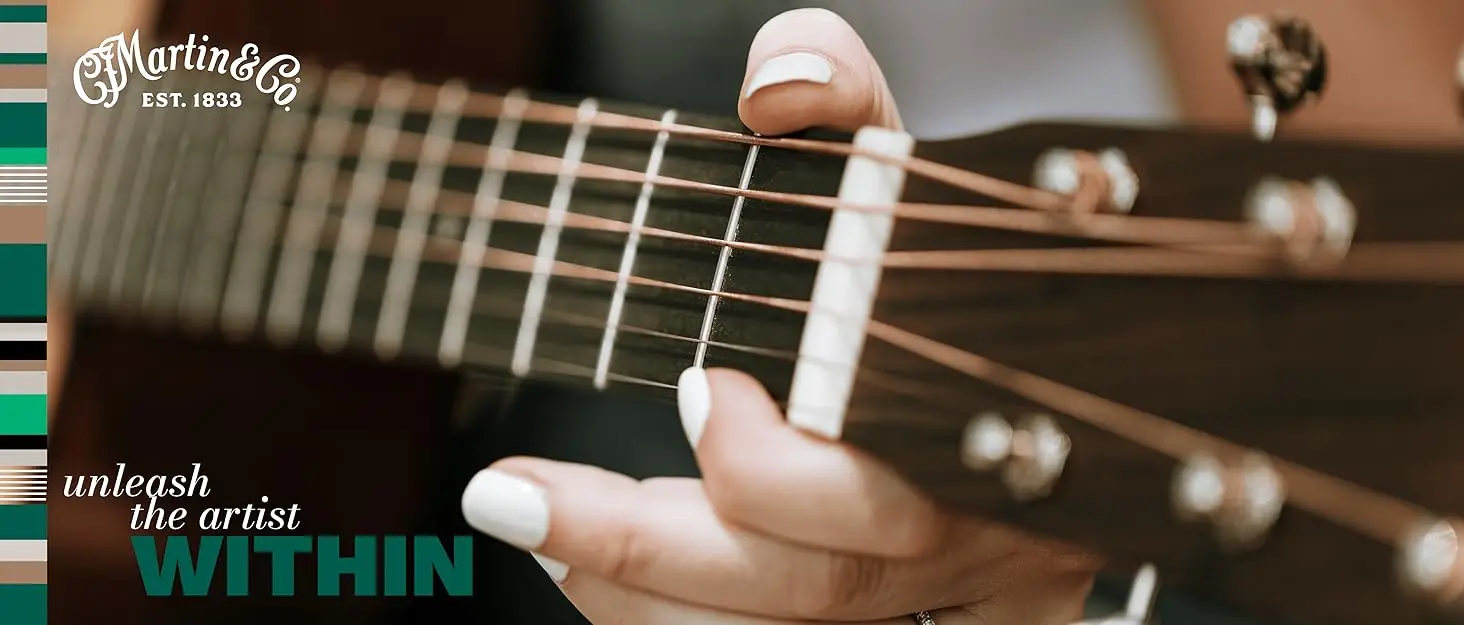 A person holding a guitar. Text reads: Unleash the artist within with Martin Guitar.