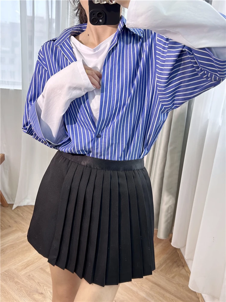 

Blue striped shirt, letter logo, fake two-piece long sleeved T-shirt, patchwork top, women's lazy and fashionable temperament