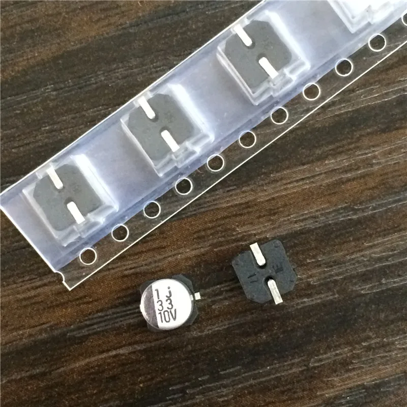 10 buah/100 buah 33uF 10V seri ELNA RV2 5x5.3mm 10V33uF jenis Chip SMD kapasitor elektrolitik aluminium