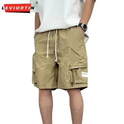 Sneldrogende Zomer Multi Pocket Dunne Effen Kleur Eenvoudige Losse Cargoshorts Heren Casual Trendy Sport Vijf Punts Broek