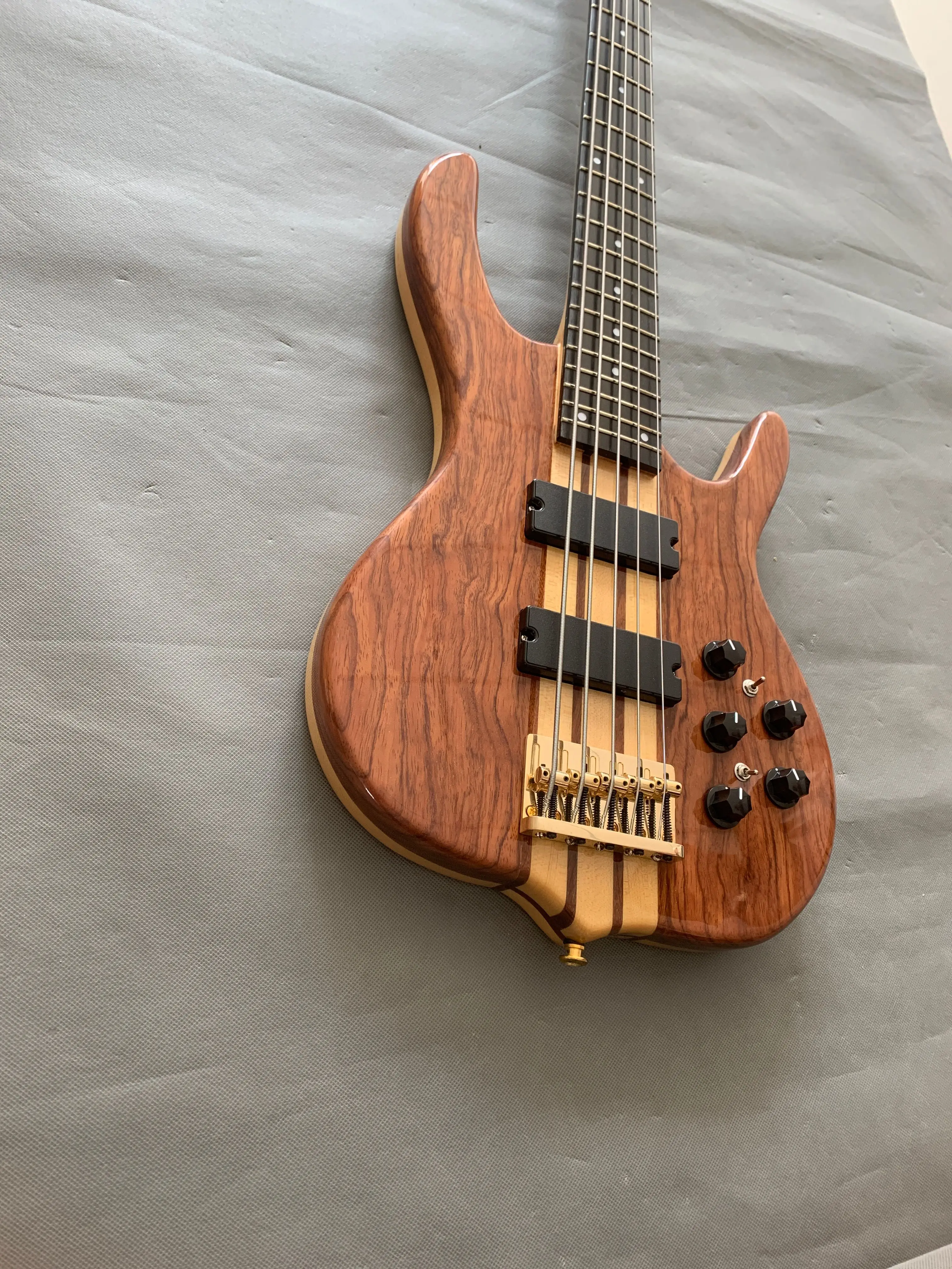 Factory direct sales, high-end customized 5 string bass electric guitar, through-body design, red flower pear veneer, active pic