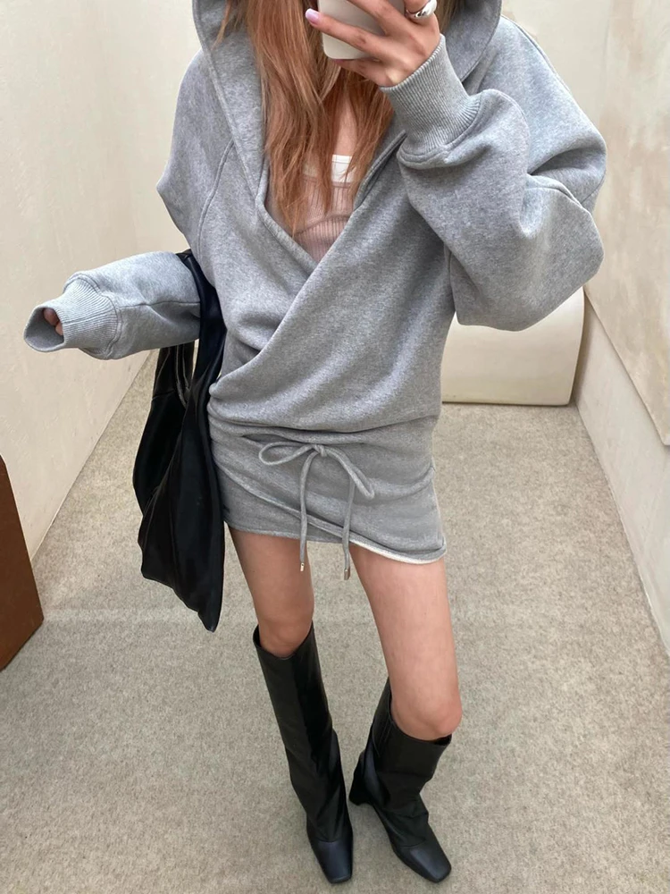 Fleece-lined sweatshirt dress—a stylish, chic grey slim-fit hooded dress with a drawstring, new for Autumn 2026.