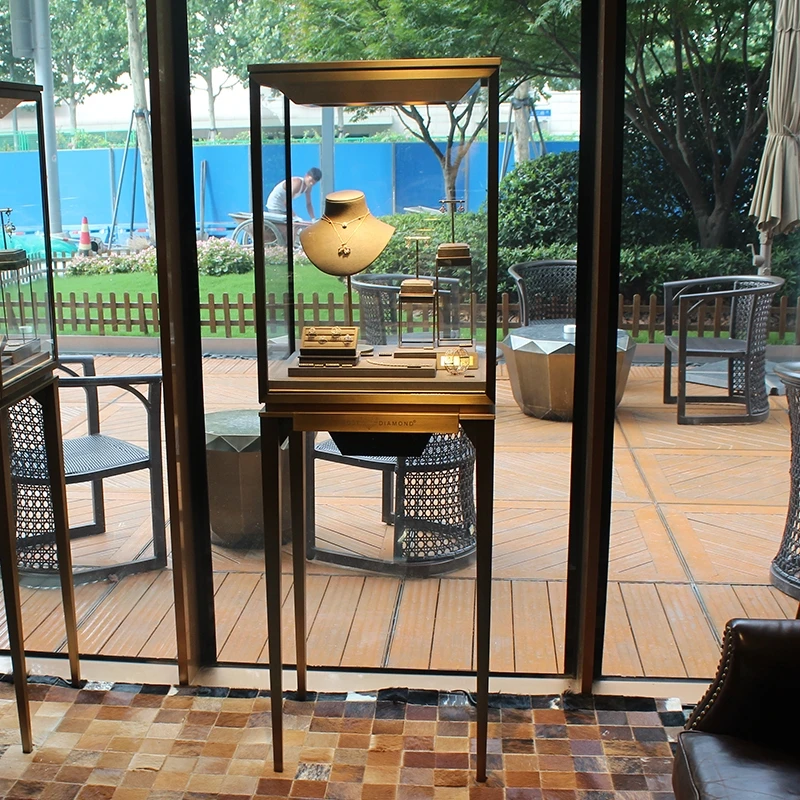Customized. luxury glass display cabinet shop furniture stainless steel jewelry display showcase with LED light