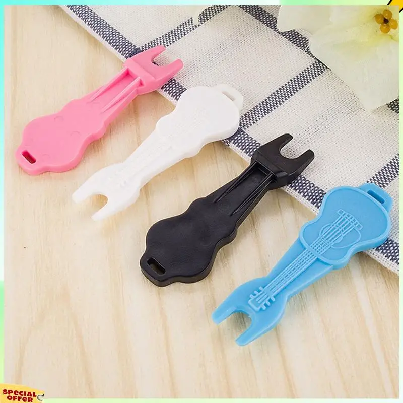

TURE 100Pcs Guitar Bridge Pins Puller Folk Guitar String Winder Peg Puller Tool Set Four Colors Randomly Guitar Accessories