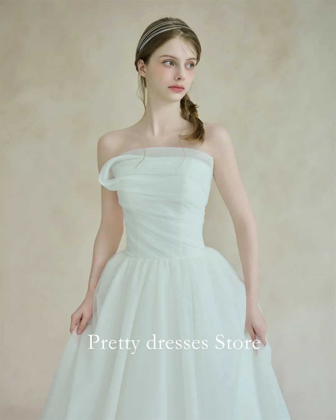 ชุดแต่งงานทรงเอไลน์ผ้าทูลล์สีไอวอรี่แบบไม่มีสายรัด ดีไซน์หรูหราสไตล์ปี 2025 สำหรับงานแต่งงานในสวน  ชุดเจ้าสาวแบบคอร์เซ็ทสำหรับงานปาร์ตี้