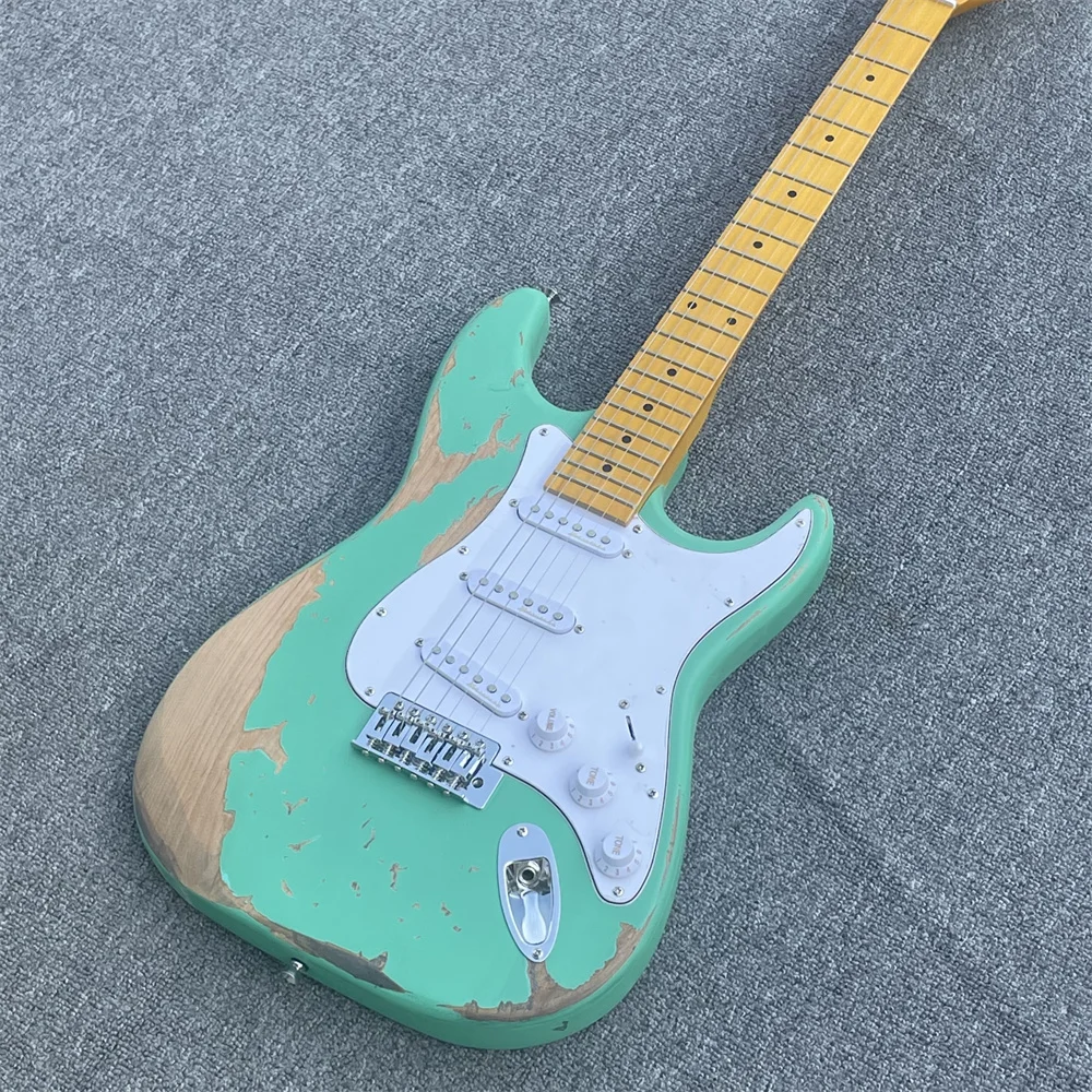 

In stock new high-quality relic left-hand ST electric guitar green hand-made old-style relic electric guitar Immediate delivery