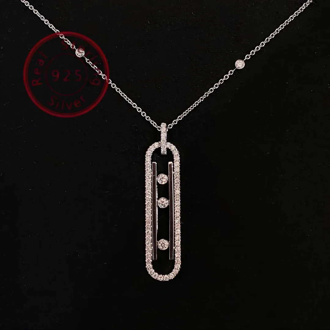 

Длинное колье из серебра S925 с подвижным камнем и тремя бриллиантами представляет собой женский подарок на годовщину. серебряное колье-колье для женщин