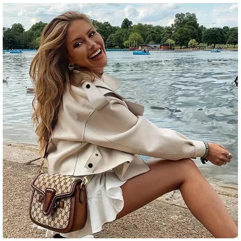 2024 herbst Neue Faux Weiche Leder Jacke Frauen Mode Weiß Lose PU Leder Kurzen Mantel Eine Taste Lokomotive Chic outwear