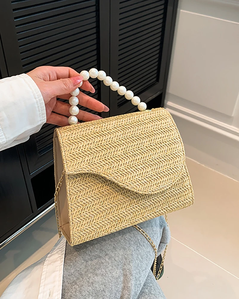 Bolso bandolera con correa de cadena trenzada con decoración de perlas