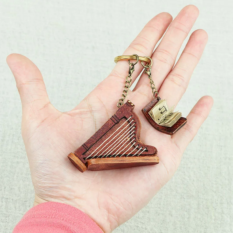 

Exquisite miniature harp keychain pendant handmade leather accessory genuine cowhide vintage and exquisite gift