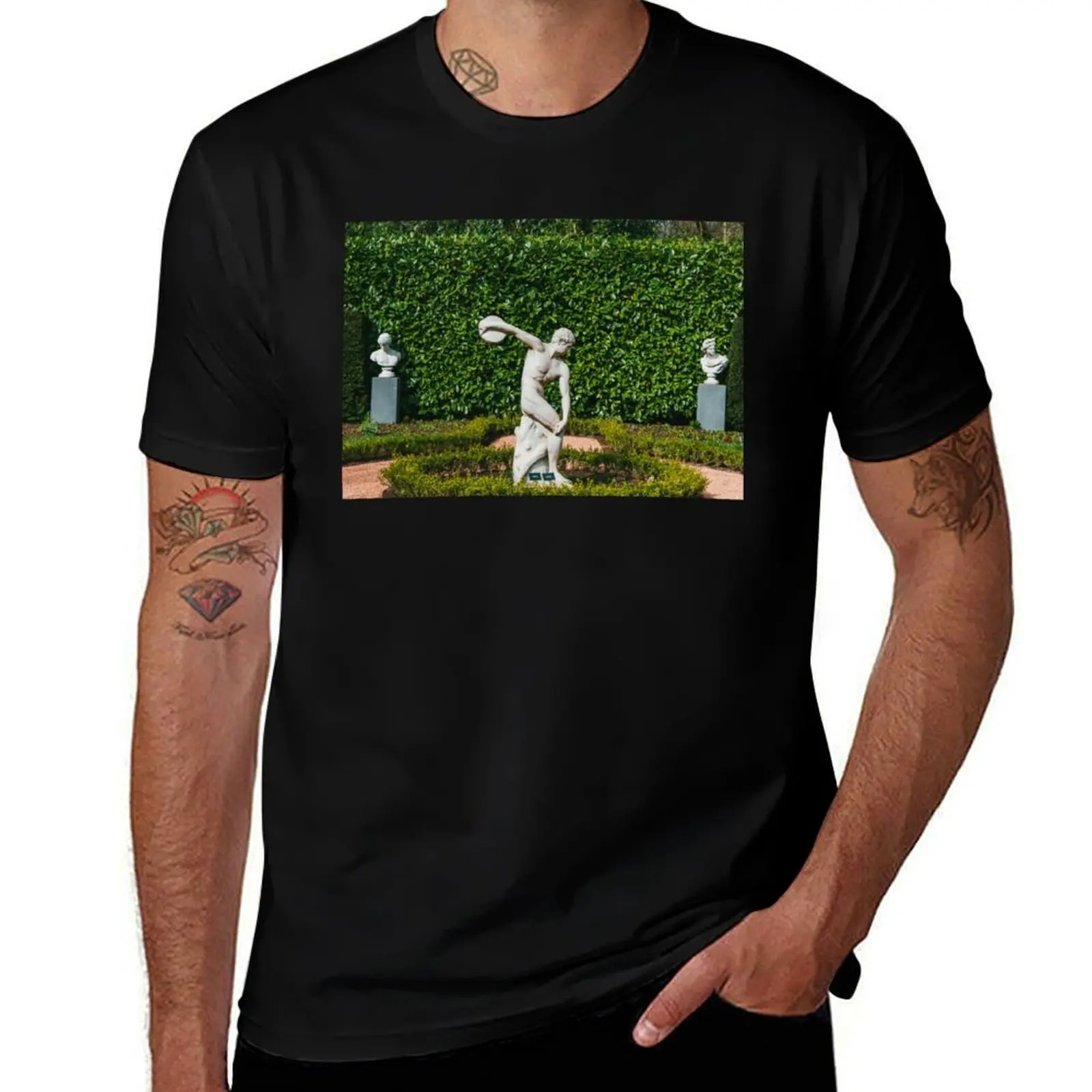 

Statue at Keukenhof Tulip Gardens in Netherlands T-Shirt Man t-shirt oversized funny gifts t shirts for men graphic
