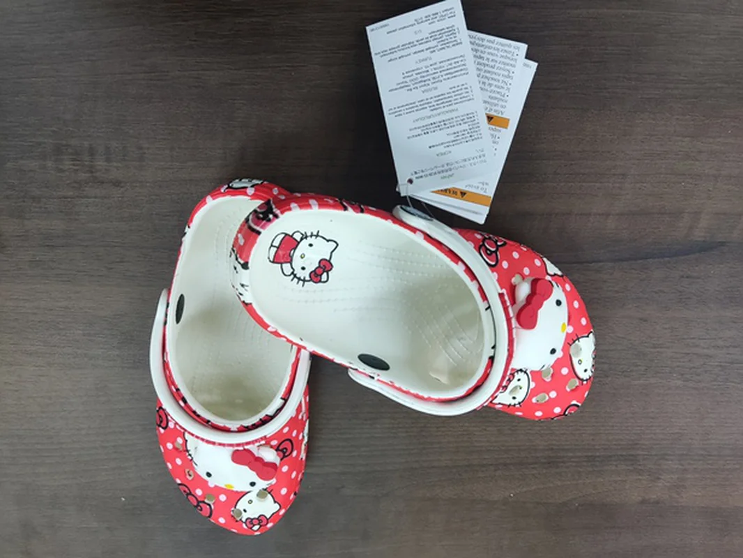 MINISO Hello Kitty Pochacco Melody verano niños dibujos animados niños zapatilla antideslizante suela blanda Wrap Toe sandalia regalo de vacaciones ﻿