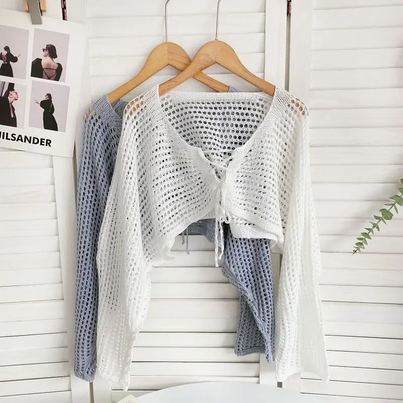 Spring and summer new sweater cardingans sense niche lace up long sleeved hollow short knitted sunscreen cardigan top women