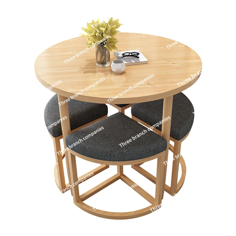 Table and chair combination can accommodate small round table stools