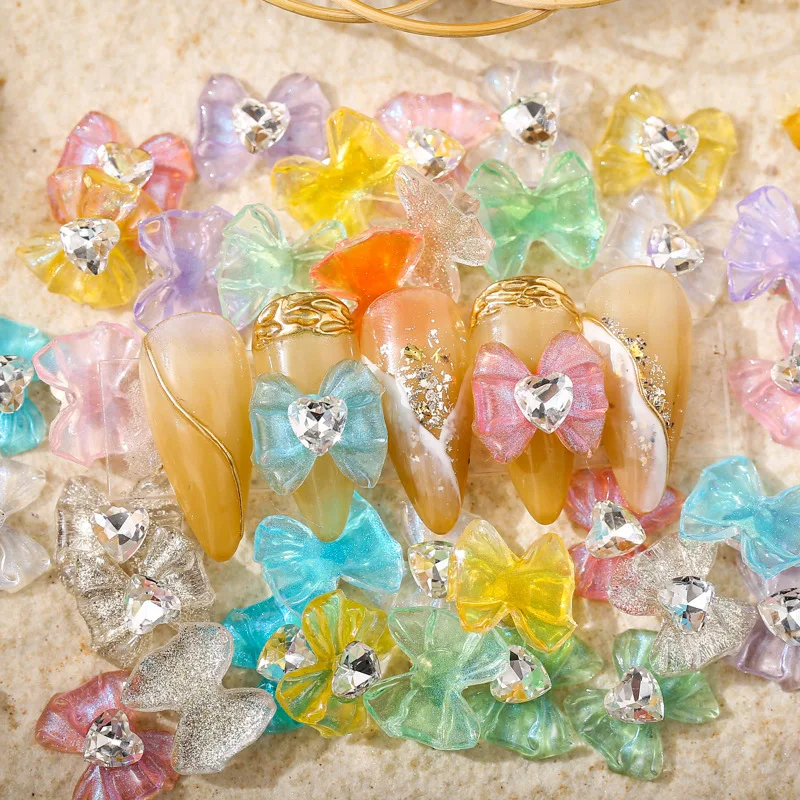 10 pz/lotto Ice Clear Nail Art Bow Charms Con Cuore Strass Gemma di Cristallo Trasparente Glitter Bowknot Unghie Decorazione Accessorio