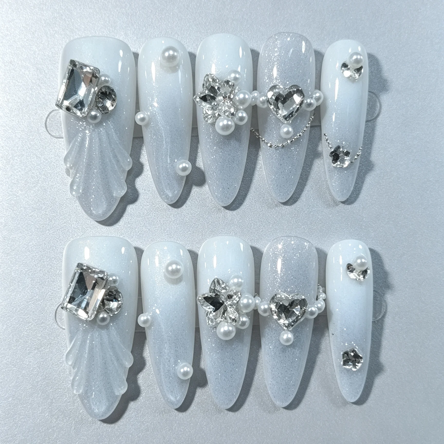 10 pieces of hand pressed almond shaped nails, beautiful fake nails, haze shimmering satin blue, suitable for women to use