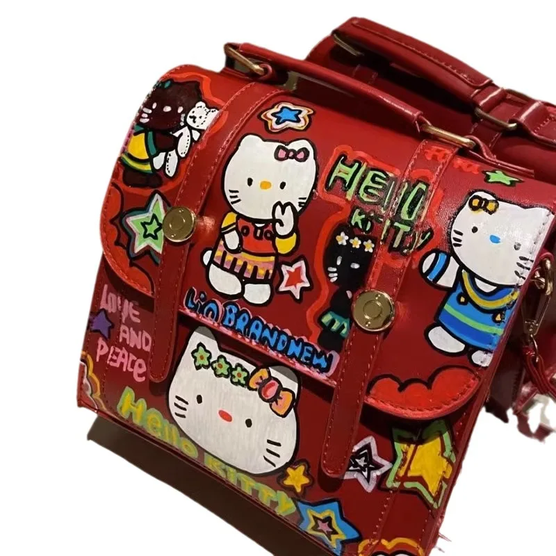 MINISO-mochila con grafiti de Hello Kitty, bolso escolar bonito para estudiantes de secundaria y secundaria, novedad de 2024