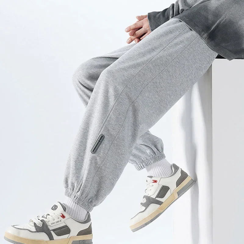 

Корейские модные джоггеры, спортивные мужские брюки, новая коллекция осенней модели, серые мешковатые широкие брюки, уличная одежда, мужские повседневные брюки с завязками