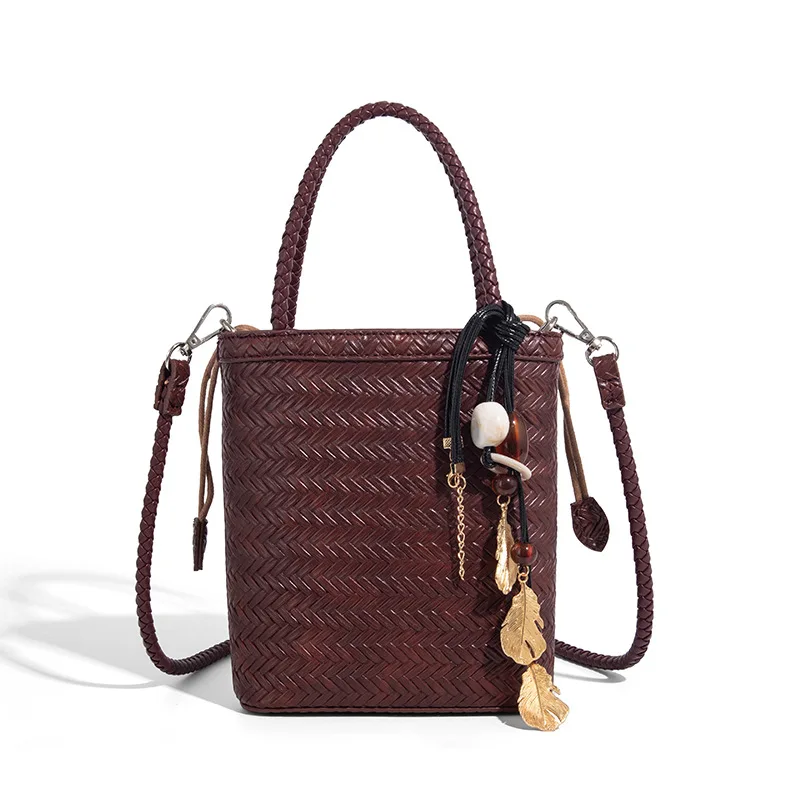 

Fashionable hand-held embossed woven pattern women's bag niche pu material large capacity single-shoulder crossbody drawstring