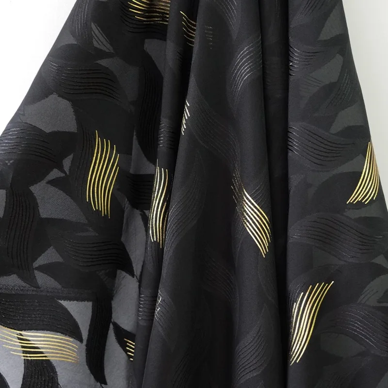 Soft Luxurious Black Chiffon Fabric with Intricate Gold Foil Cutouts - Ideal for Designer Clothing and Accessories By The Meter