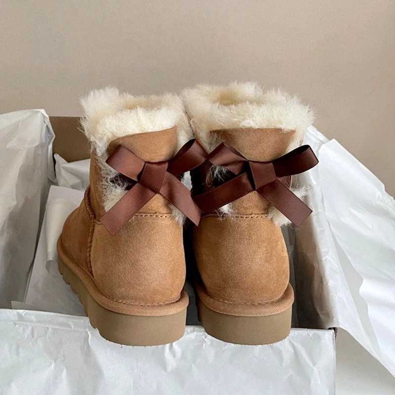 Aobreugg 2023 new snow boots women's winter plus fleece thickened natural fur wool fur integrated women's cotton shoes ribbon bo