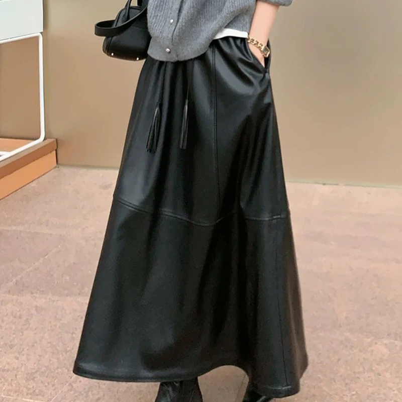 Long Leather Skirts Autumn Women Sheepskin Elastic Waist  Big Swing Black Versatile A-Line Umbrella Skirt With Tassel Bell Decor