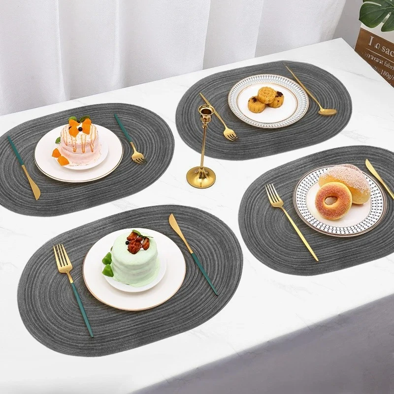 

Мягкая тканая хлопчатобумажная пряжа, изолированная подставка для столовых приборов овальной формы, отель, западный ресторан, европейский стиль, простой и легко чистящийся настольный коврик
