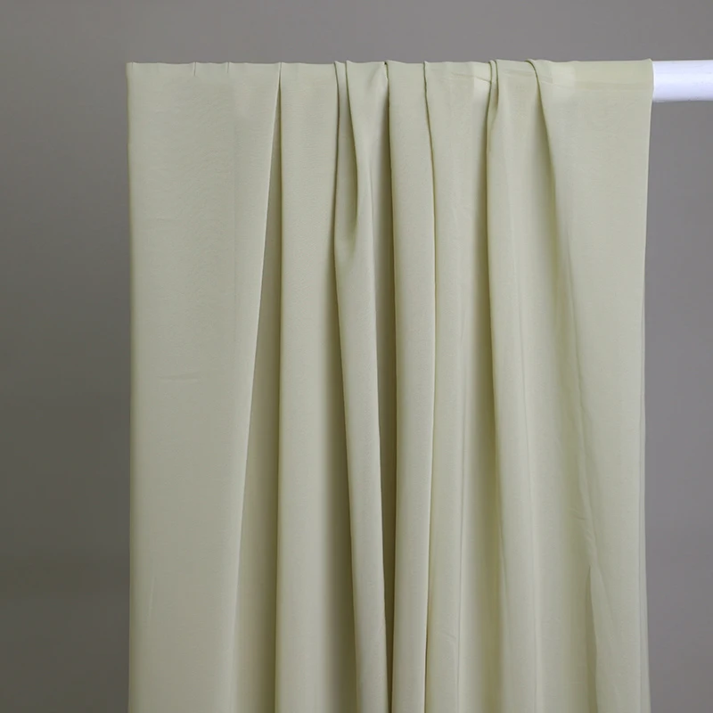 Luxurious Avocado Green 100D Chiffon Fabric for Clothing and Wedding Decor Perfect for Stunning Drapes and Ceremony Backdrops