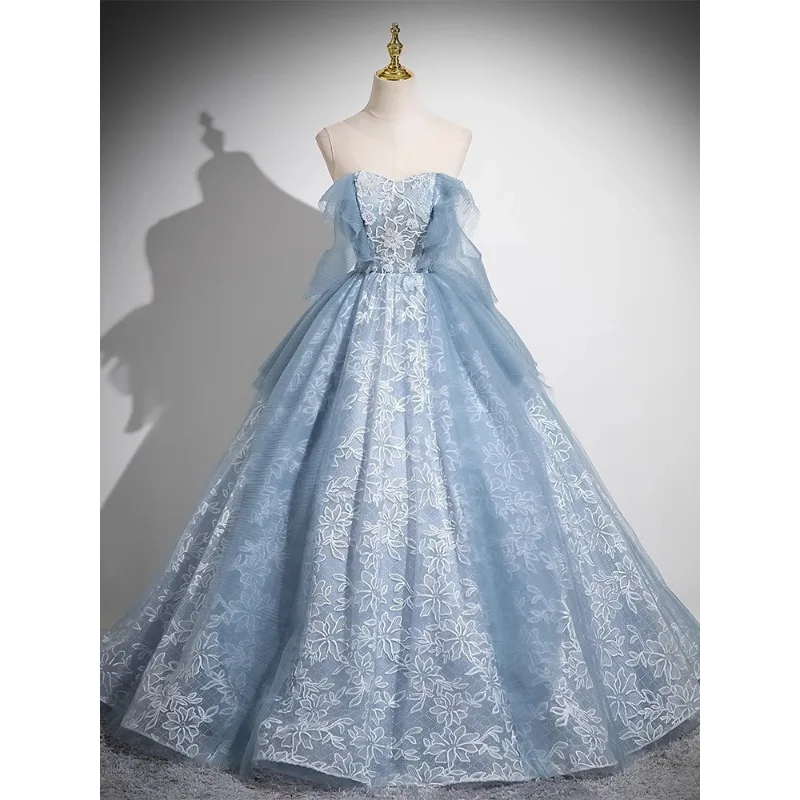 Vestido de banquete azul sin tirantes con temperamento elegante y de alta gama, vestido mullido de malla con palabras adelgazantes, vestido de noche largo