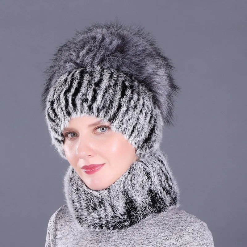 A fashionable woolen hat for women warm scarf thickened imitation ball with ear
