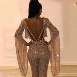 Sexy Backless Hollow Bandage Jumpsuit Women Spring O-neck Flare Sleeve Straight Playsuit Fall Sequin Shiny Party Romper Overalls