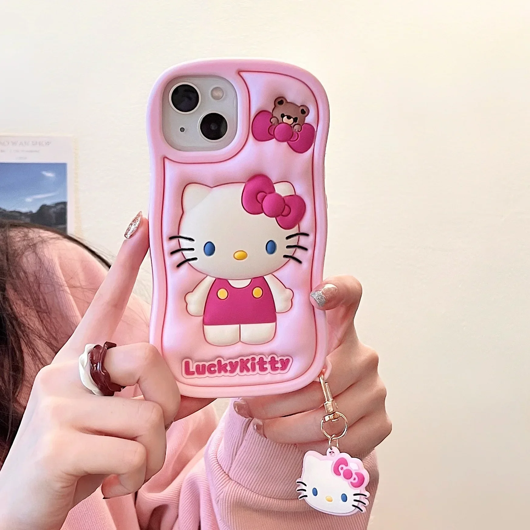 

Sanrio Hello Kitty iPhone 15 Promax Case iPhone 14/12/13 Pro shockproof and drop-resistant silicone three-dimensional phone case