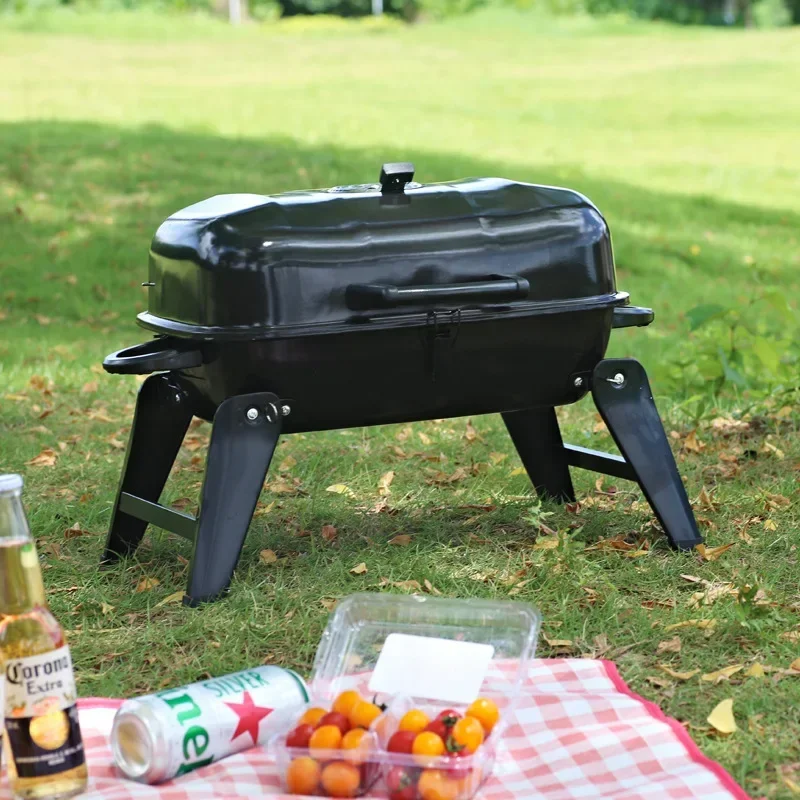 Portable and foldable small hamburger barbecue grill with insulated net and grilled integrated tabletop