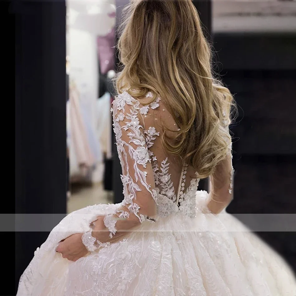 Flavinke カスタマイズされた夜会服のウェディングドレスプリンセス背中の開いたビーズレースアップリケ長袖ブライダルドレス Vestidos De Novia