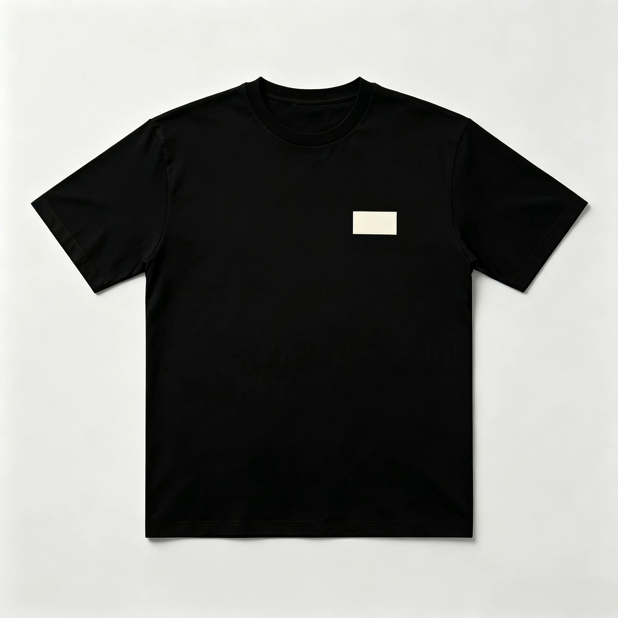 Unisex Black T‑Shirt Minimalist Small Square Patch Chest Print Short Sleeve Tops Simple Graphic Tees Men Women Loose Fit Cotton Streetwear